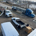 Commercial units being delivered to a site to be installed by Missouri Furnace & Air Conditioning.