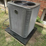 A GE AC unit installed by Missouri Furnace & Air Conditioning.
