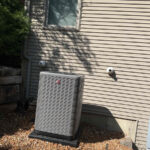 A Rheem AC unit installed by Missouri Furnace & Air Conditioning.