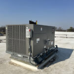 Ruud commercial AC installation by Missouri Furnace & Air Conditioning.