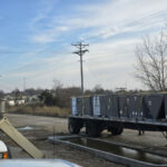 Missouri Furnace & Air Conditioning loading Ruud commercial rooftop AC units.